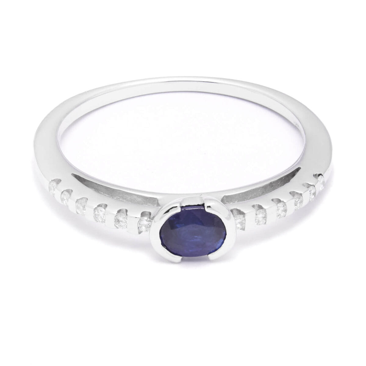 Anello in oro bianco con zaffiro centrale 0,25ct e diamanti sul gambo 0,06ct