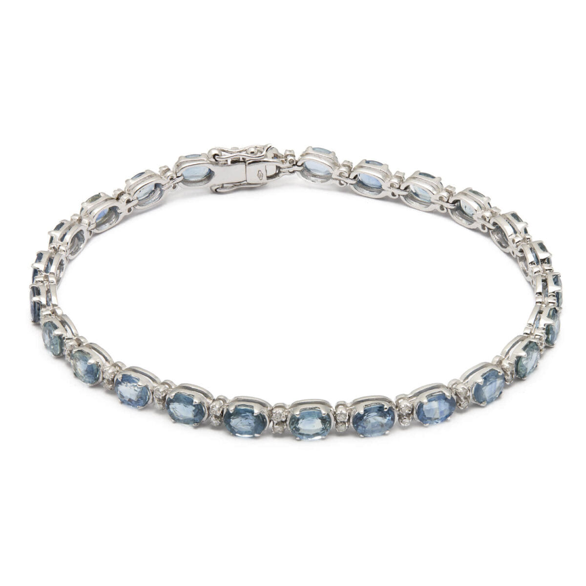 Bracciale tennis in oro bianco con zaffiri e diamanti