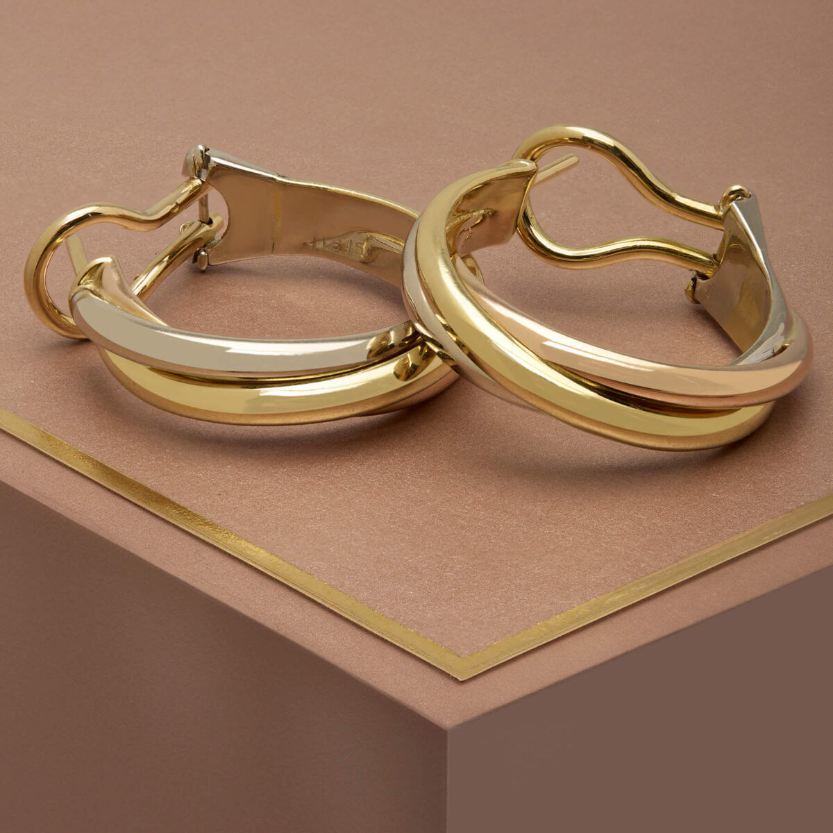 Orecchini Cartier trinity in oro bianco giallo e rosa