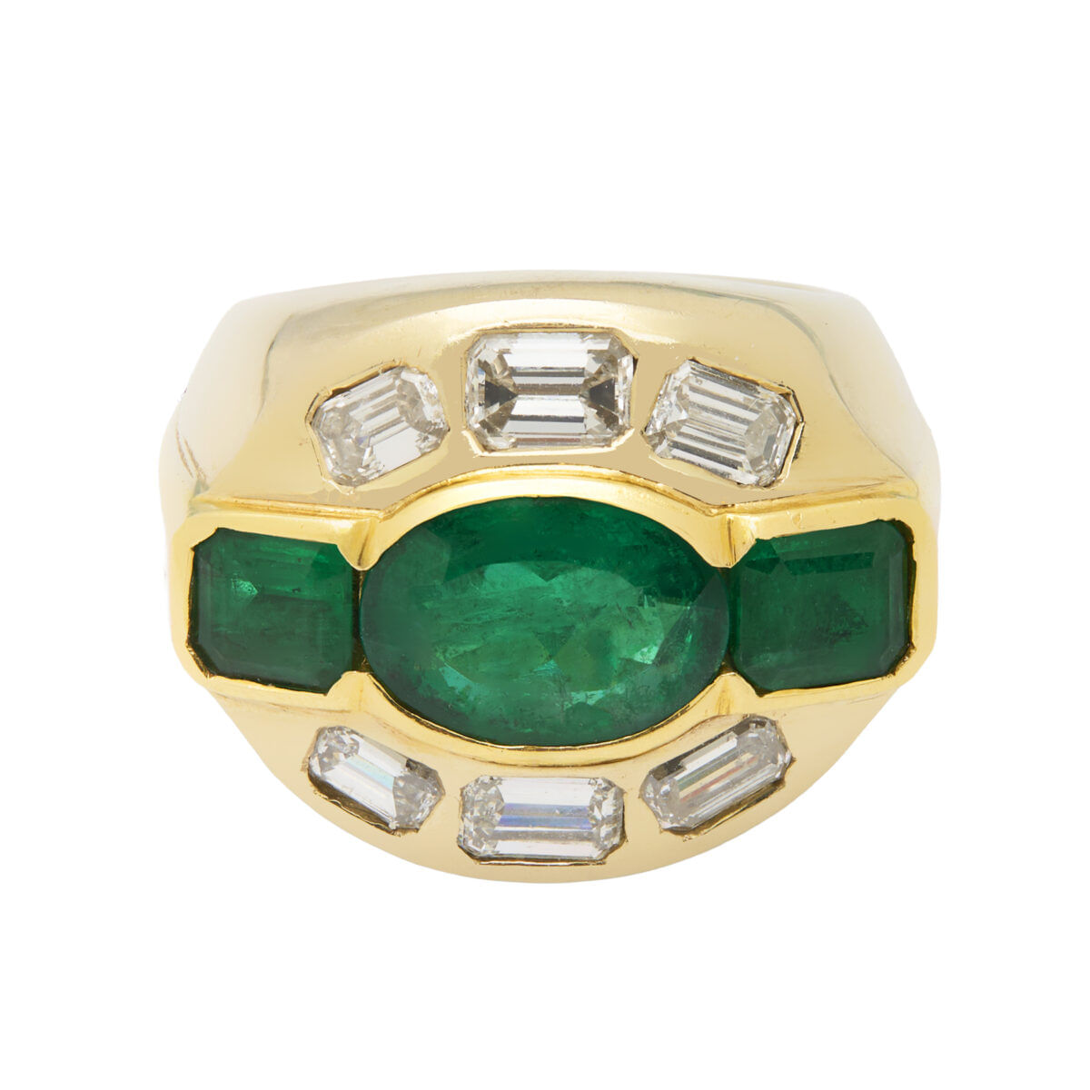 Anello in oro bianco e giallo con diamanti e smeraldi