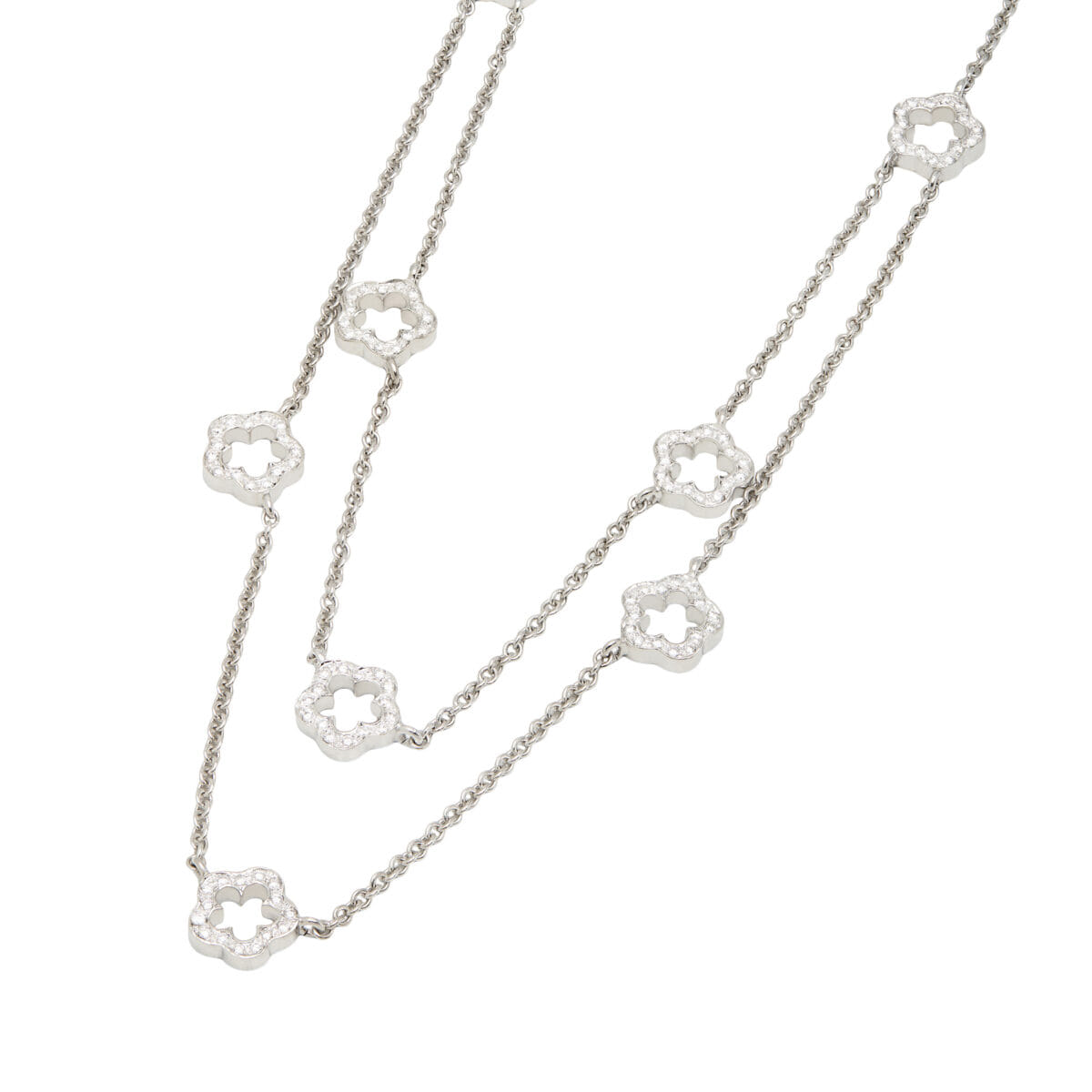 Collana doppio filo in oro bianco con elementi a fiore e diamanti