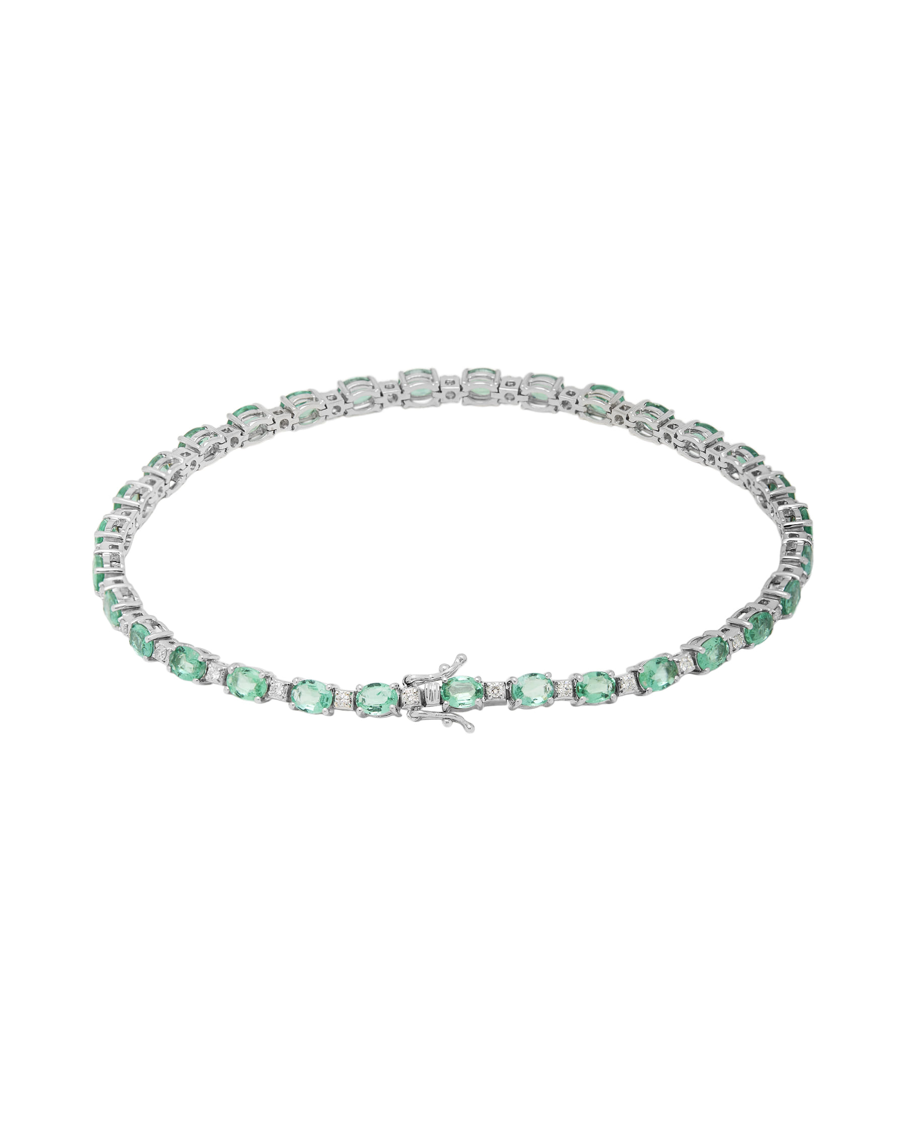 Bracciale tennis in oro bianco con smeraldi e diamanti-1