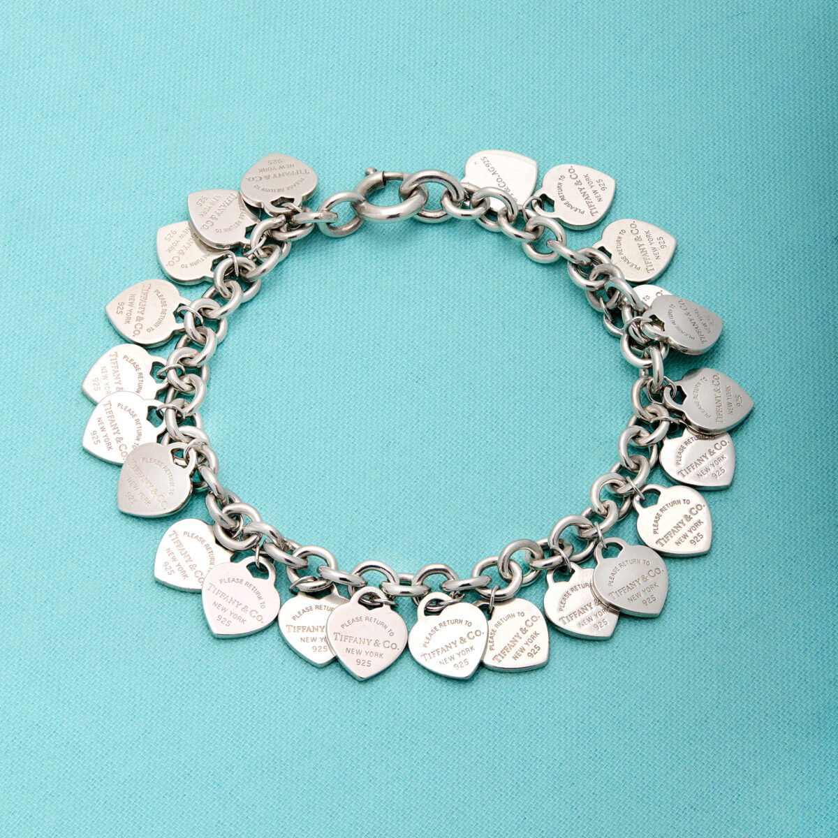 Bracciale return to tiffany multi-heart tag in argento-1