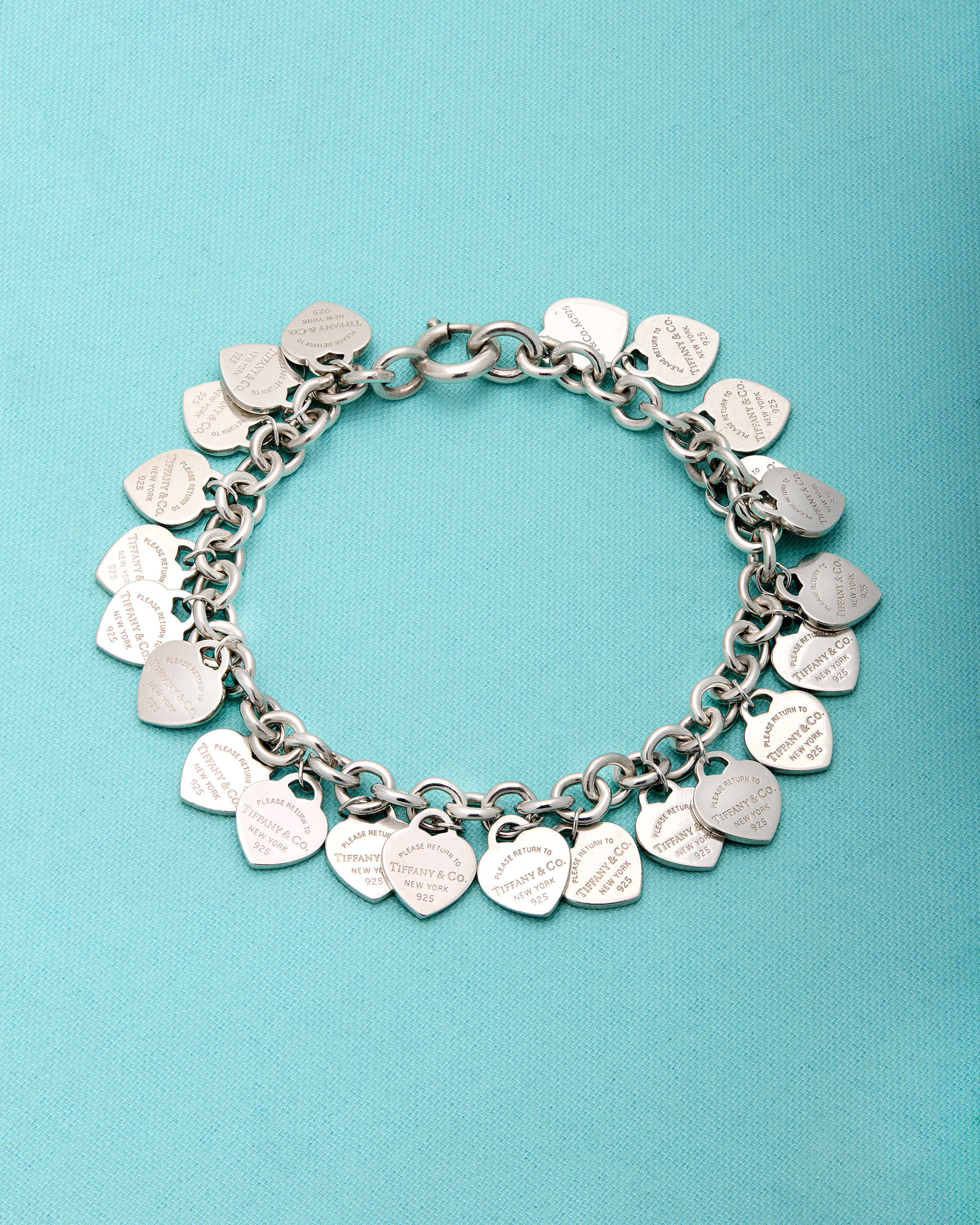Bracciale return to tiffany multi-heart tag in argento-1