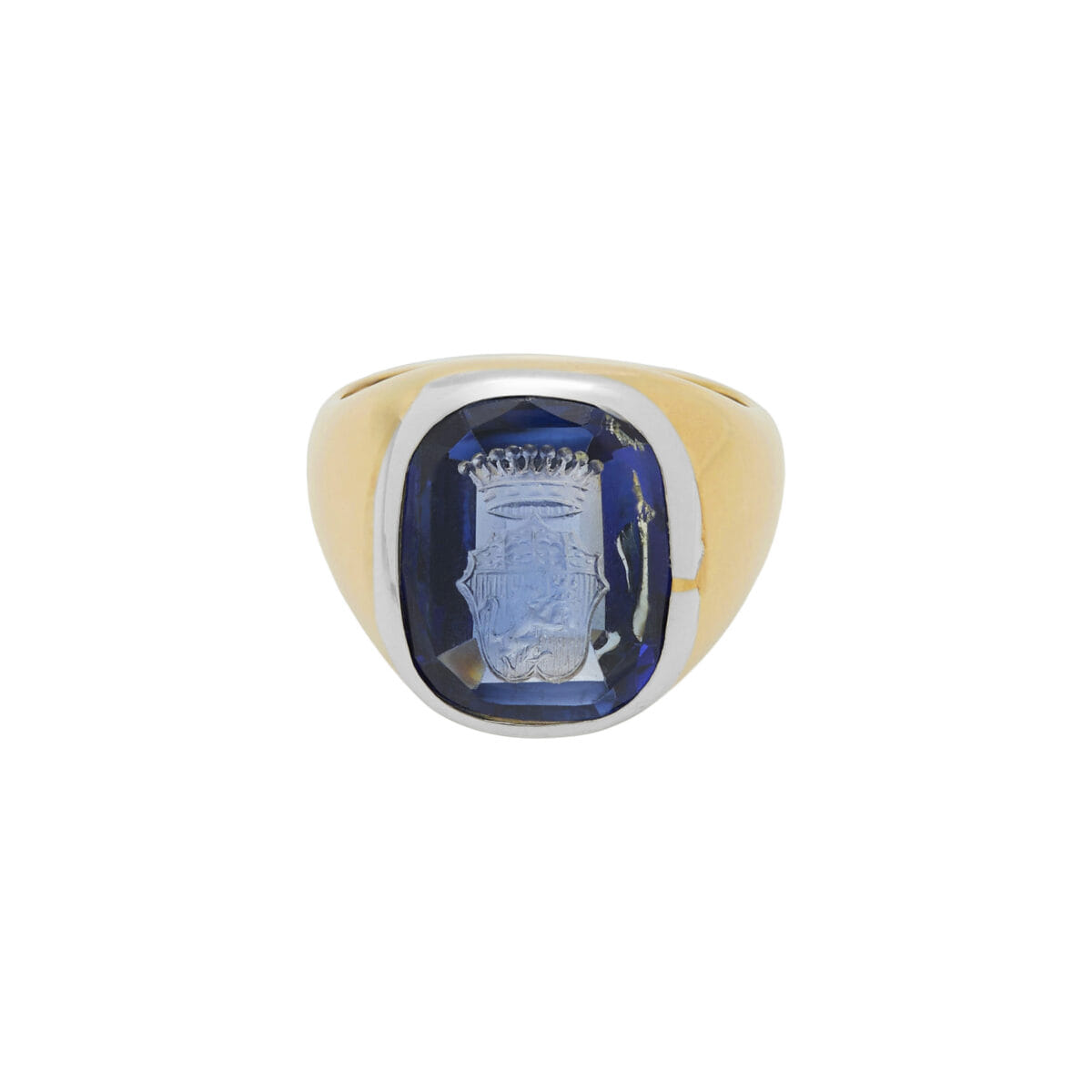 Anello sigillo oro bianco e giallo con tanzanite e stemma centrale-1