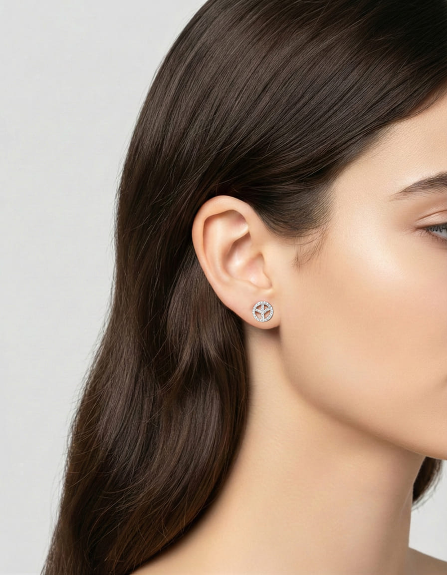 Orecchino singolo con simbolo della pace in oro e diamanti-3