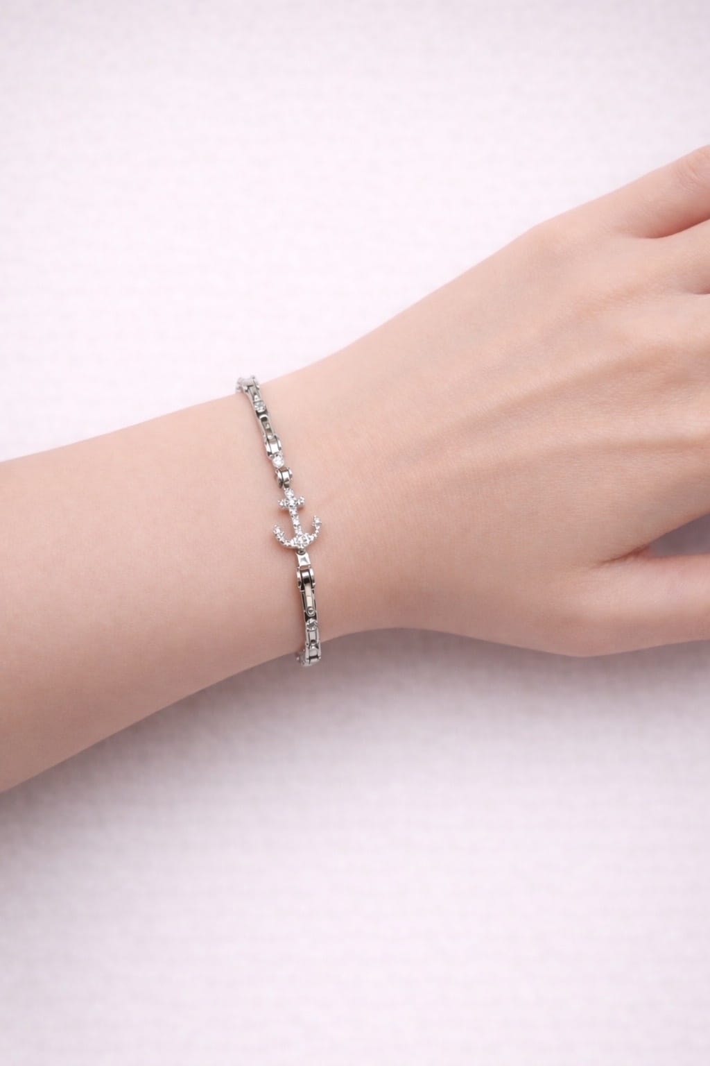 Bracciale snodato con ancora in oro bianco e diamanti-3