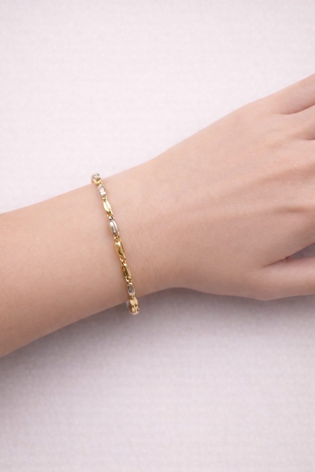 Bracciale chicchi di riso in oro giallo e bianco-3