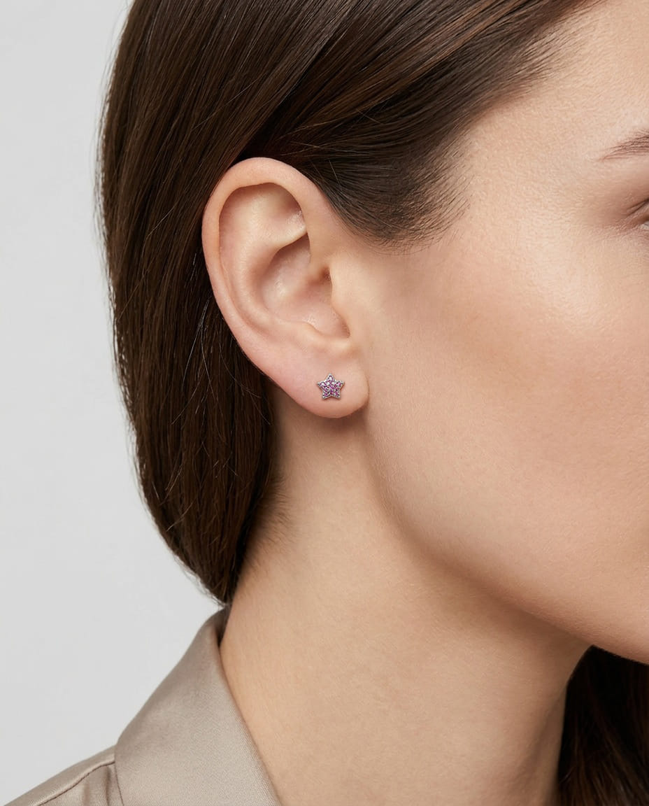 Orecchini stella in oro nero con zirconi-3