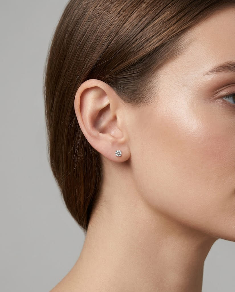 Orecchini punto luce in oro bianco e diamanti 0,665 ct-3