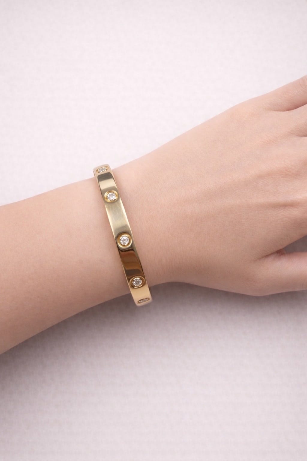 Bracciale cartier love in oro giallo e diamanti-3