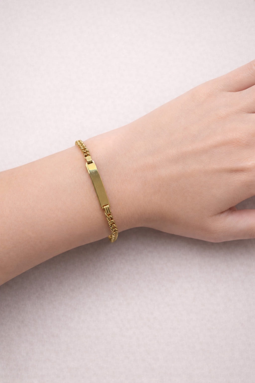 Bracciale targhetta in oro giallo maglia groumettina-3