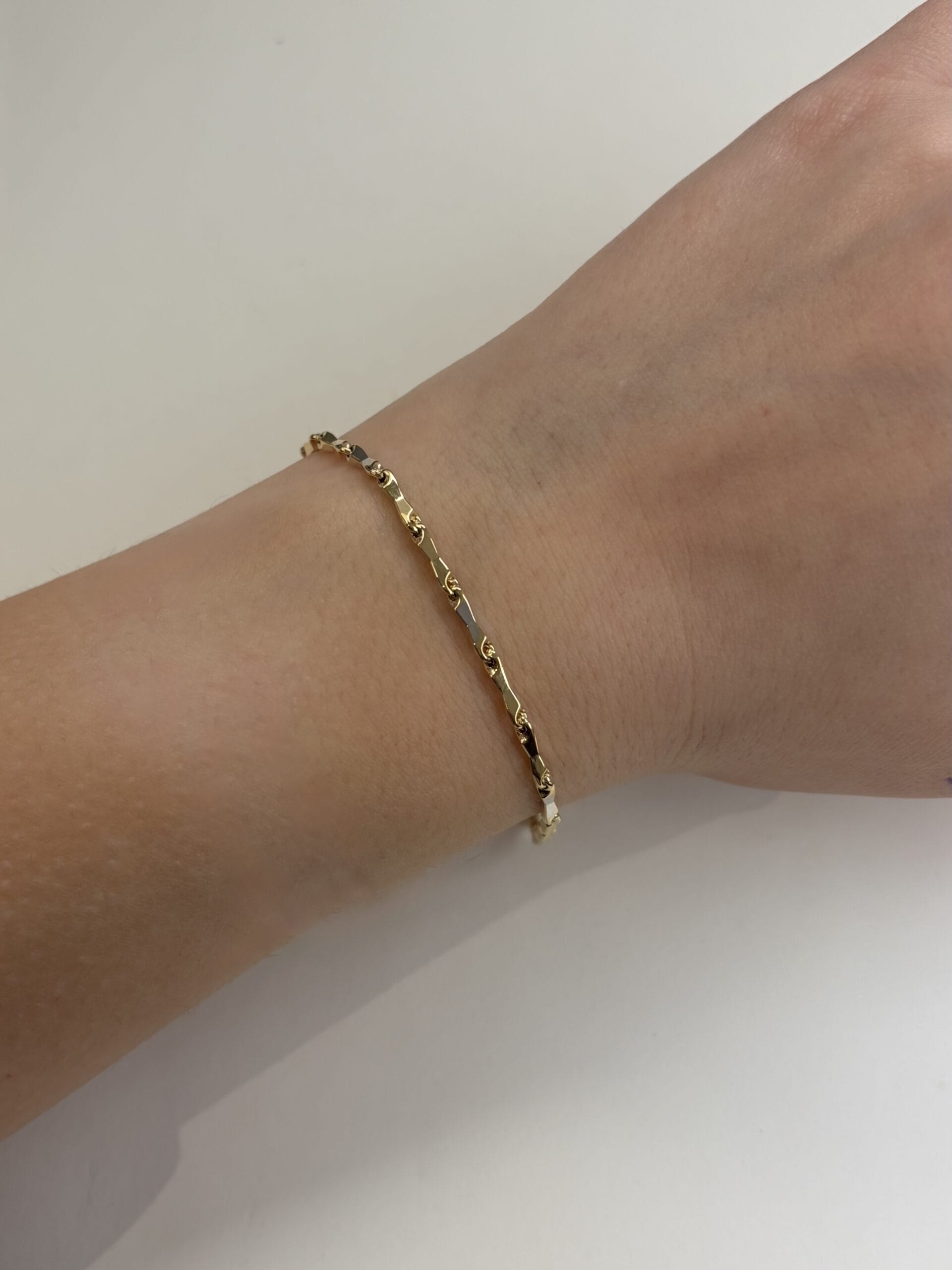 Bracciale chicchi di riso in oro giallo e bianco-3