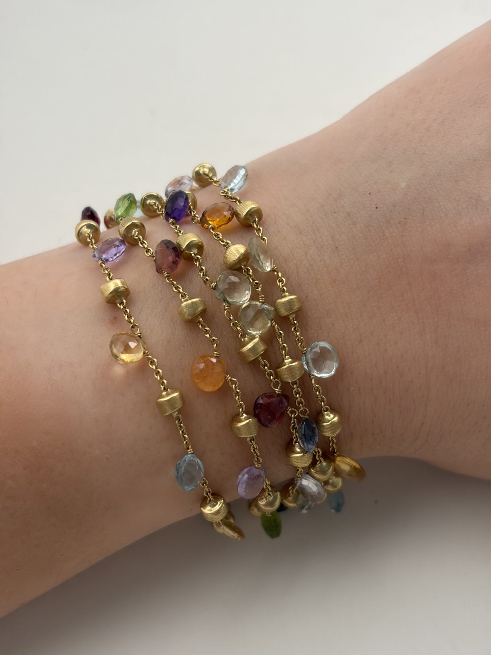 Bracciale marco bicego paradise in oro giallo a 5 filli con gemme colorate-3