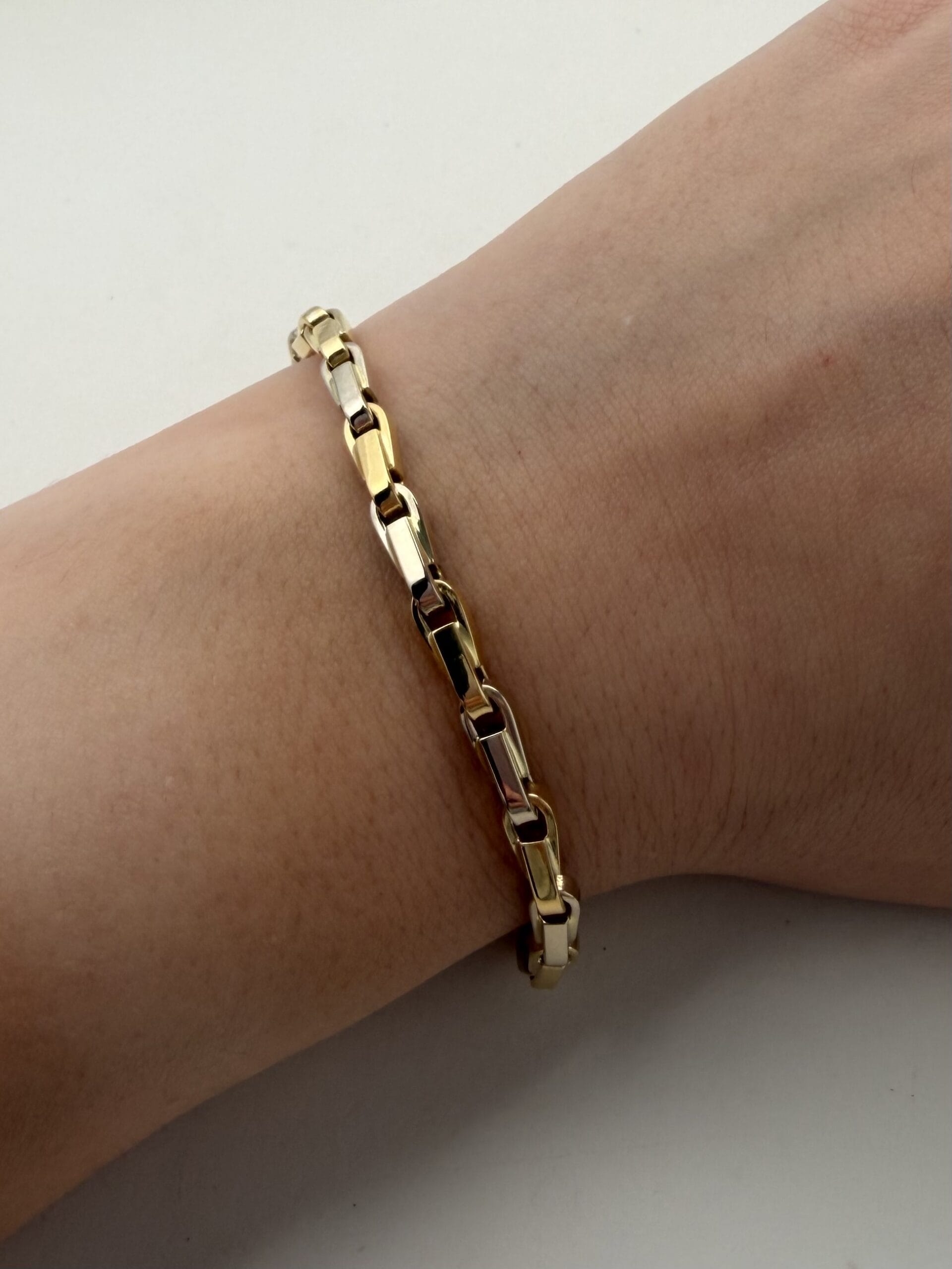 Bracciale oms in oro giallo e bianco-3