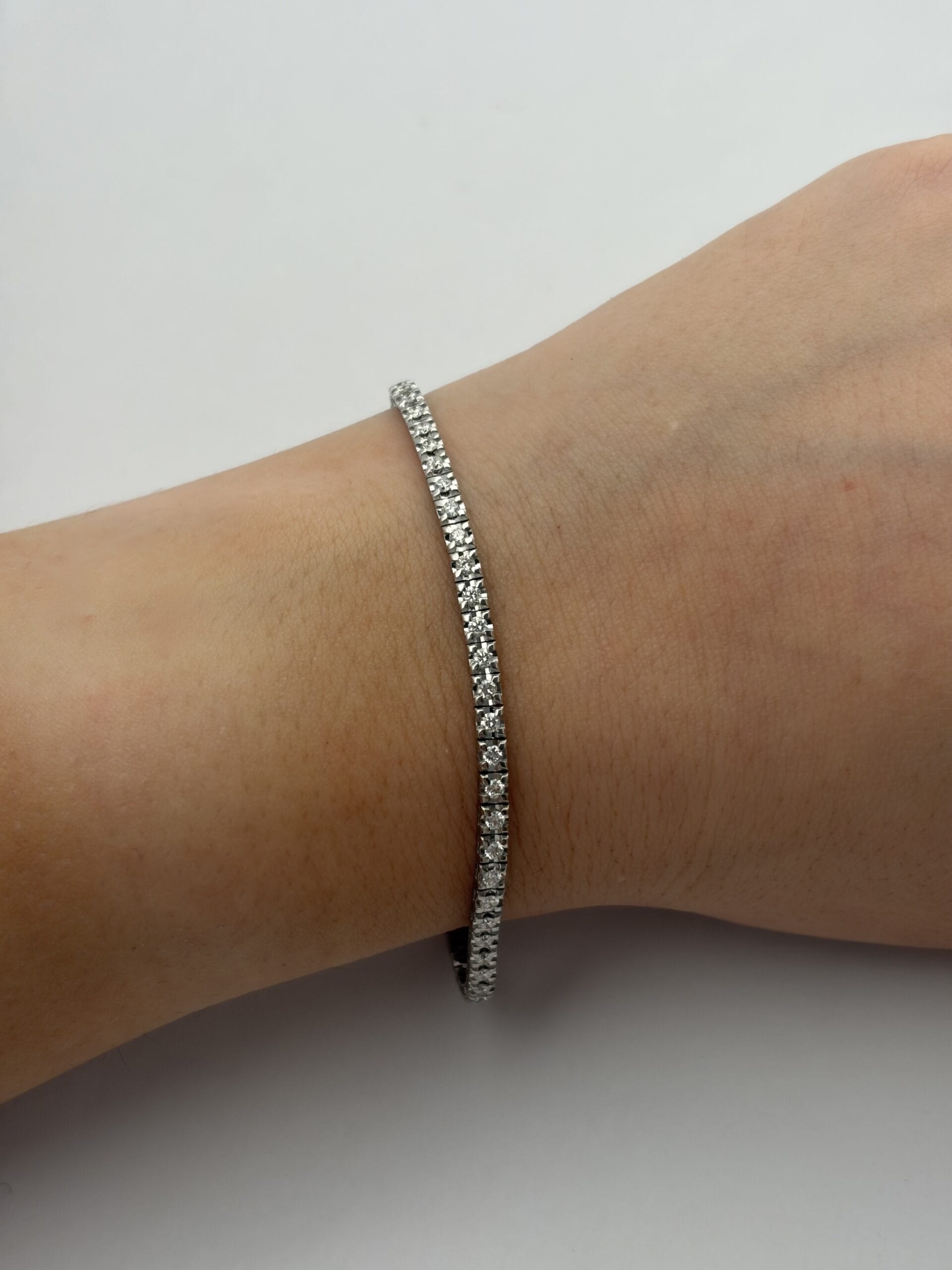 Bracciale tennis illusion oro bianco e diamanti-3