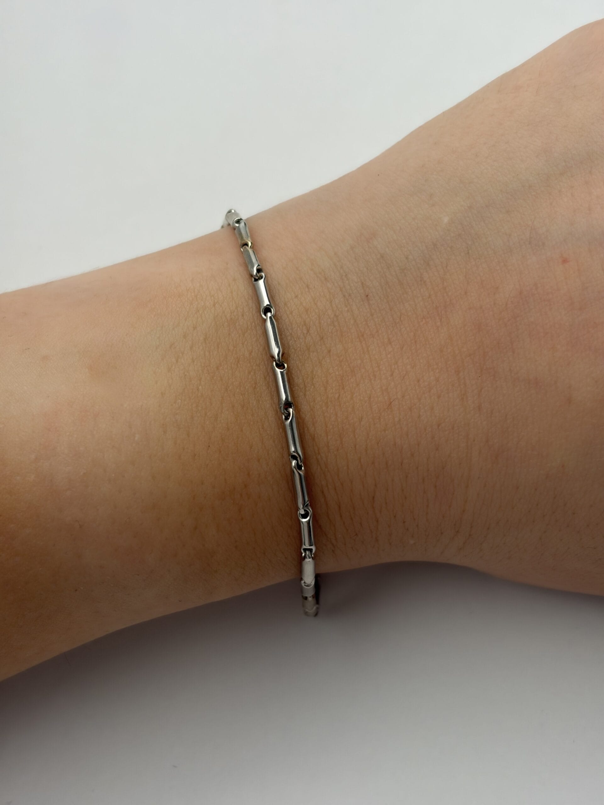 Bracciale chimento chicchi di riso in oro bianco-3