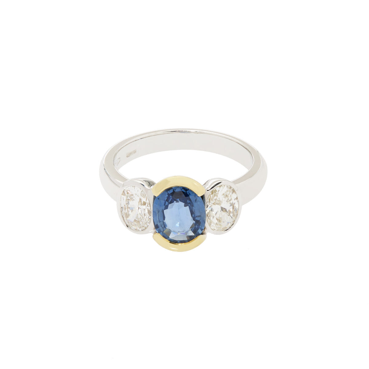 Anello in oro bianco e giallo con zaffiro centrale e diamanti-1
